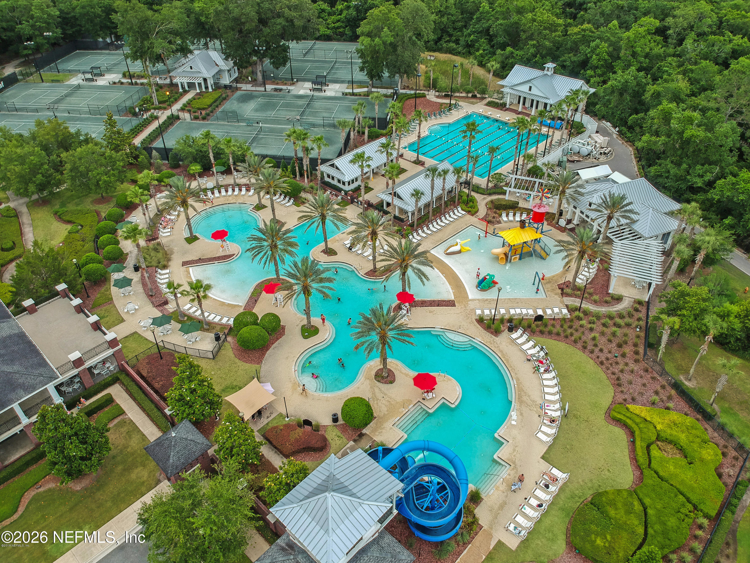 3260 Chestnut Ridge Way Orange Park, FL 32065 - Photo 35 of 39 an aerial view of a swimming pool yard and outdoor seating