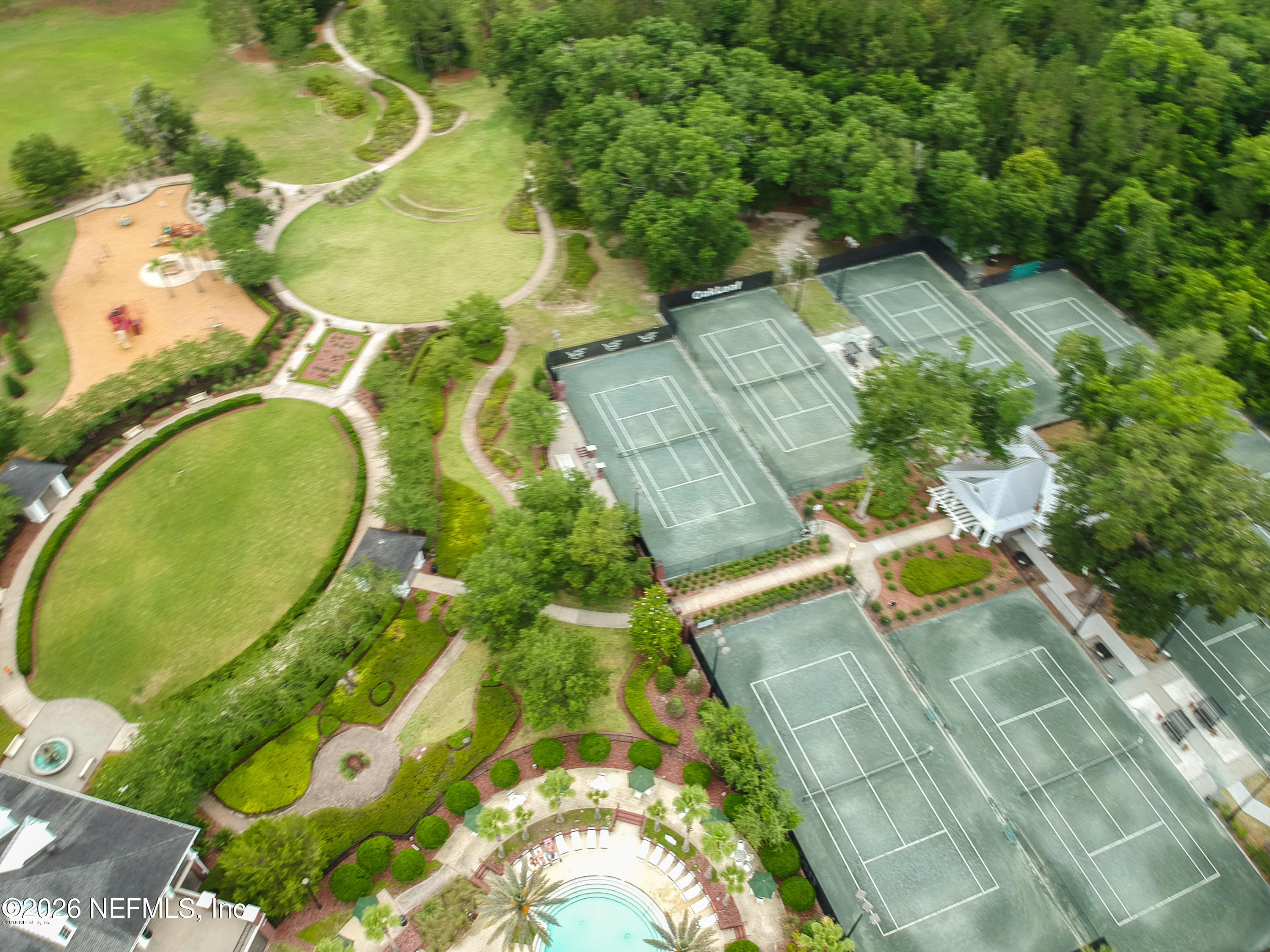 3260 Chestnut Ridge Way Orange Park, FL 32065 - Photo 36 of 39 an aerial view of a swimming pool