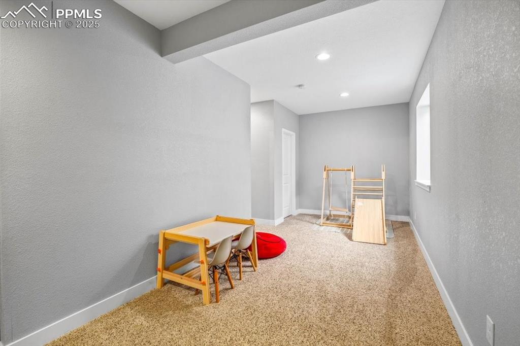 293 3rd Avenue Deer Trail, CO 80105 - Photo 18 of 28 a room with furniture and air hockey table