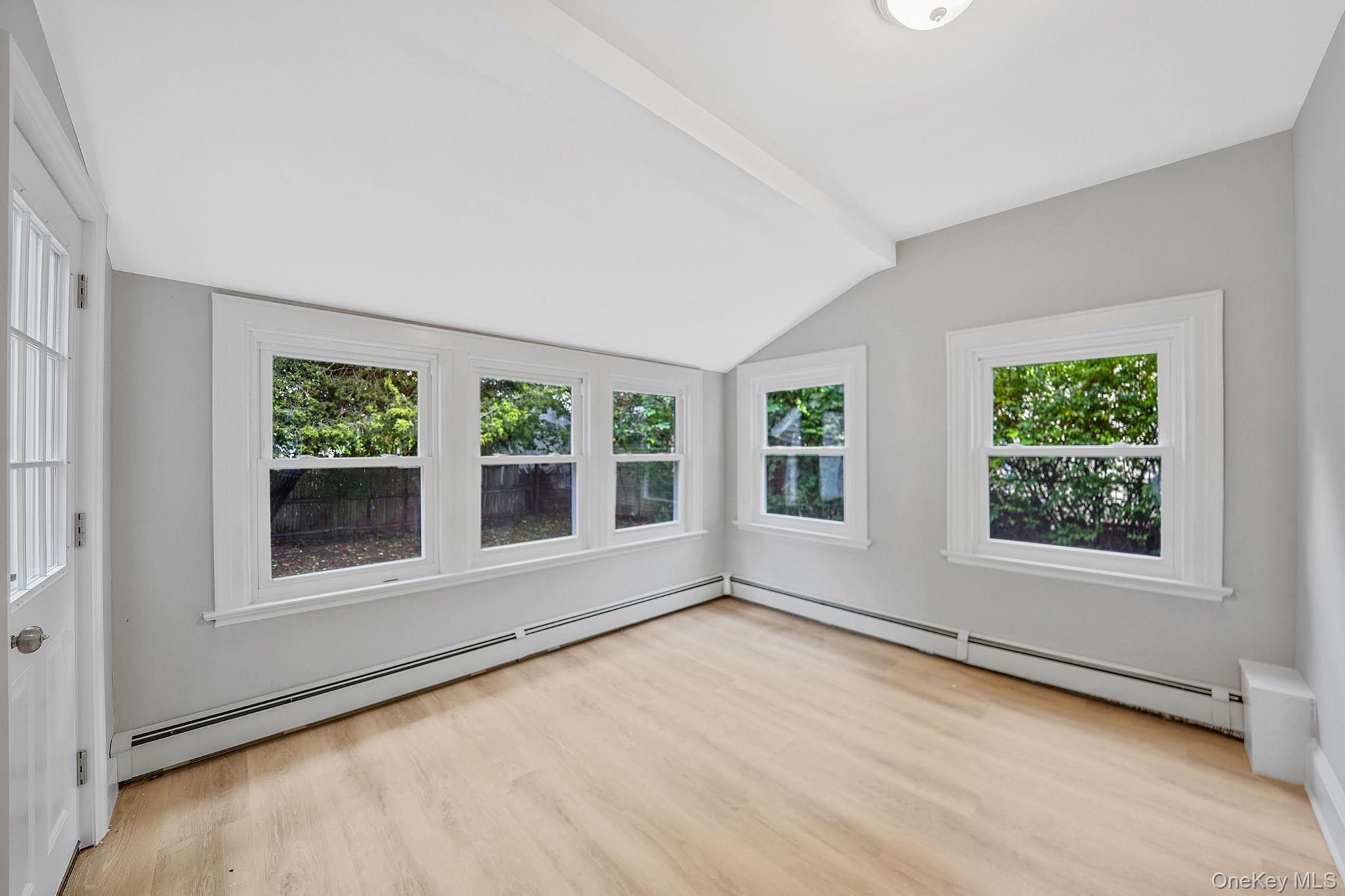 132 Duncan Road Hempstead, NY 11550 - Photo 18 of 21 an empty room with a window