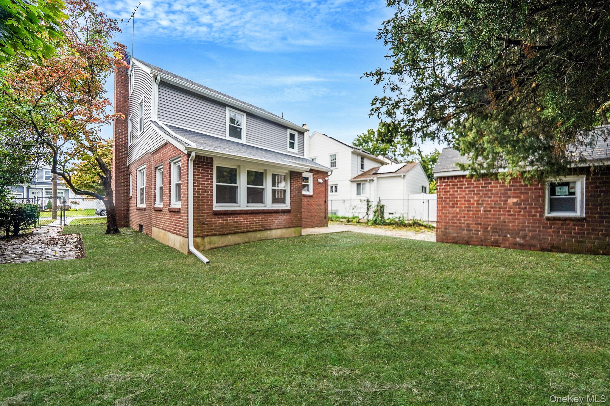 132 Duncan Road Hempstead, NY 11550 - Photo 3 of 21 a view of a house with a backyard