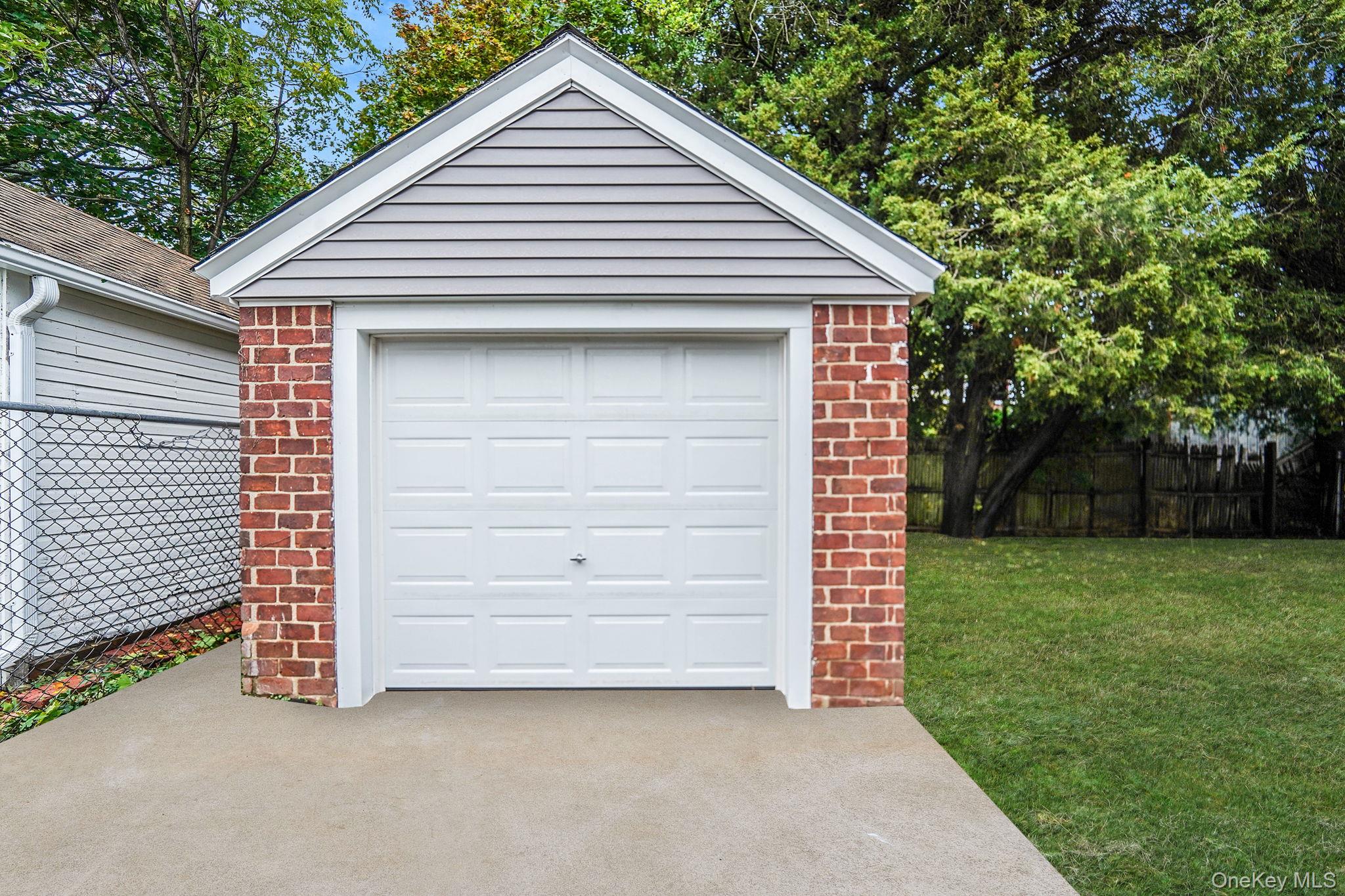 132 Duncan Road Hempstead, NY 11550 - Photo 5 of 21 a front view of a house with a yard