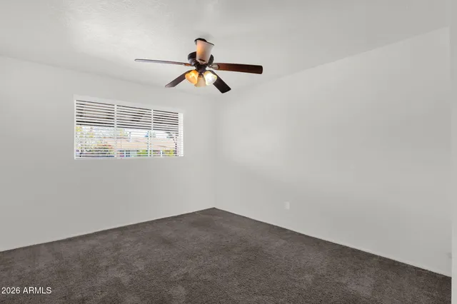 a view of a yard with swimming pool