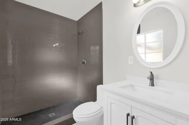 an aerial view of a city with lots of residential buildings