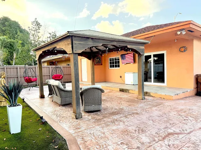 a front view of a house with patio