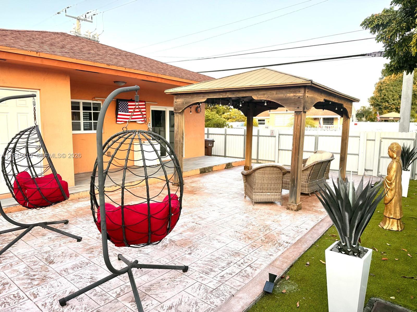 690 East 6th Place Hialeah, FL 33010 - Photo 17 of 18 a view of a dining room with furniture