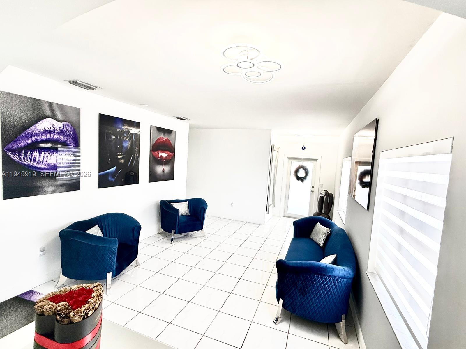 690 East 6th Place Hialeah, FL 33010 - Photo 4 of 18 a living room with furniture