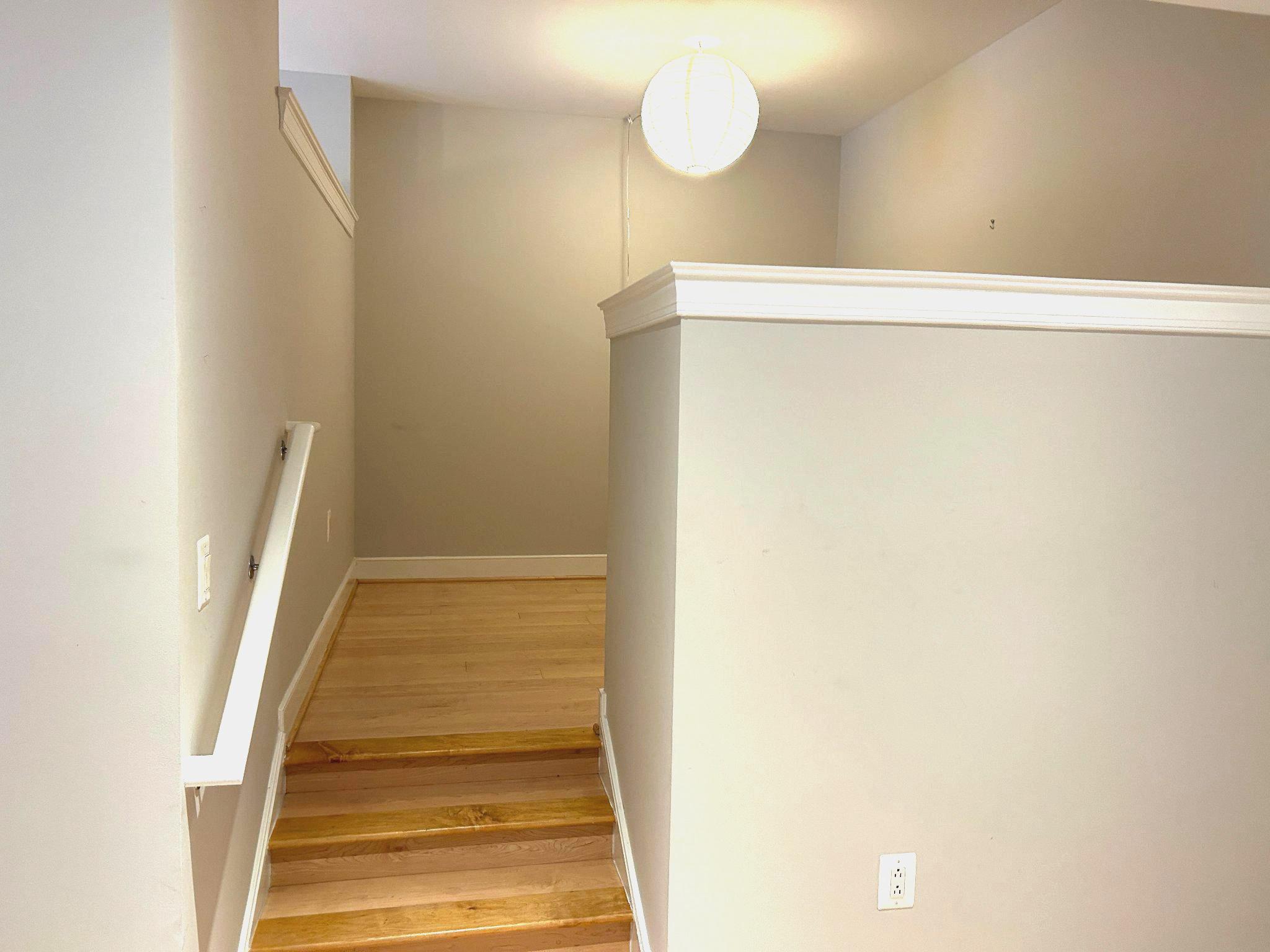 2425 L Street Northwest, Unit 421 Washington, DC 20037 - Photo 16 of 18 Steps leading to upper den.