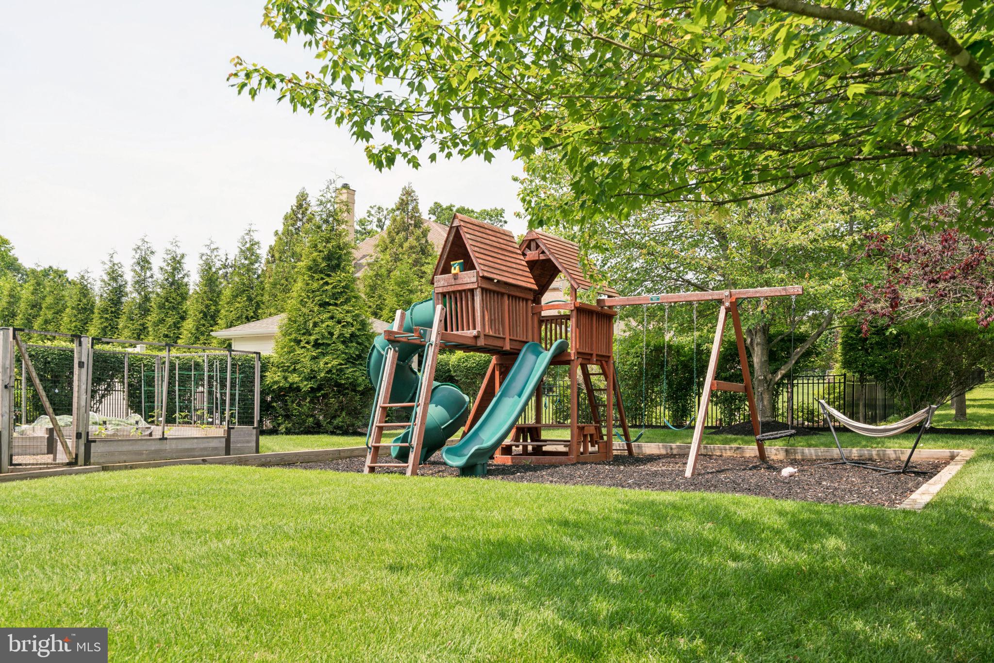 801 South Penn Oak Road Lower Gwynedd, PA 19002 - Photo 102 of 114 a view of a park with swings and slides