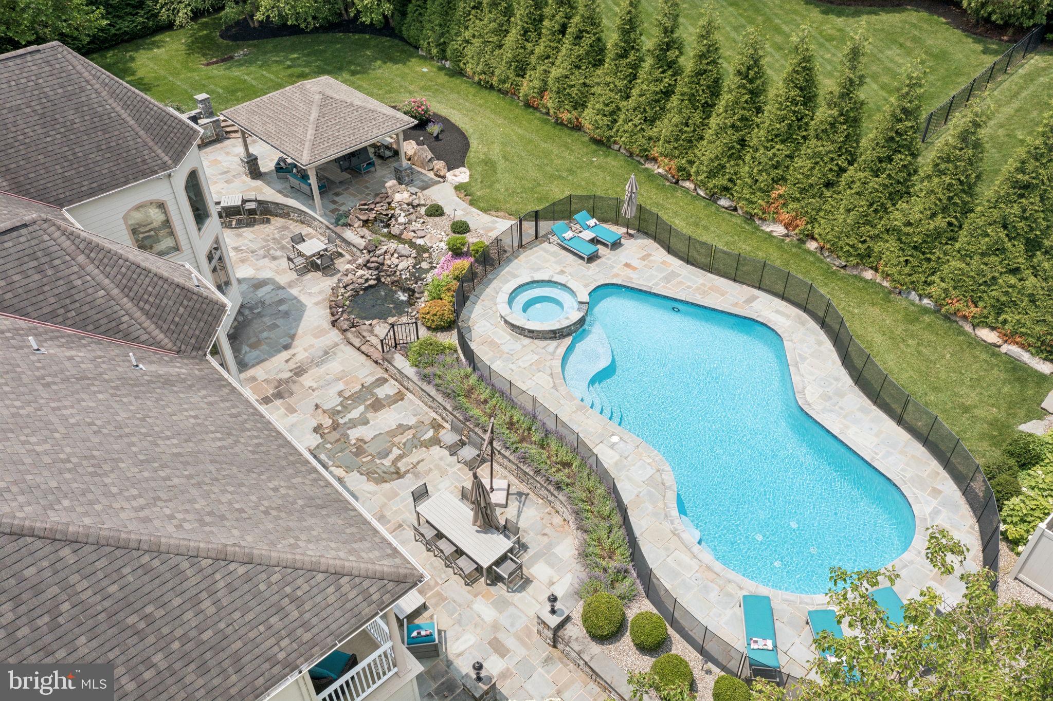 801 South Penn Oak Road Lower Gwynedd, PA 19002 - Photo 105 of 114 an aerial view of a house with outdoor space and a lake view
