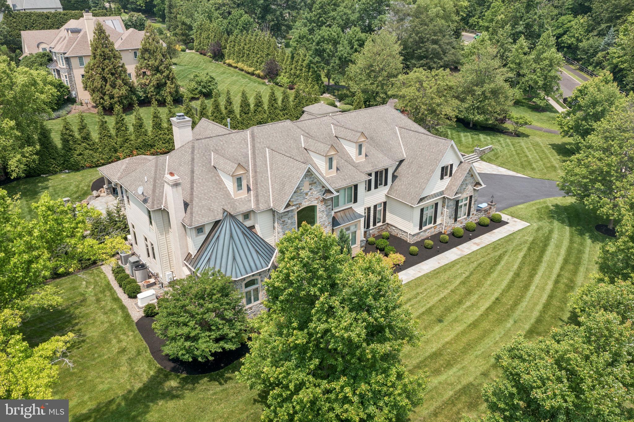 801 South Penn Oak Road Lower Gwynedd, PA 19002 - Photo 114 of 114 an aerial view of a house with a yard