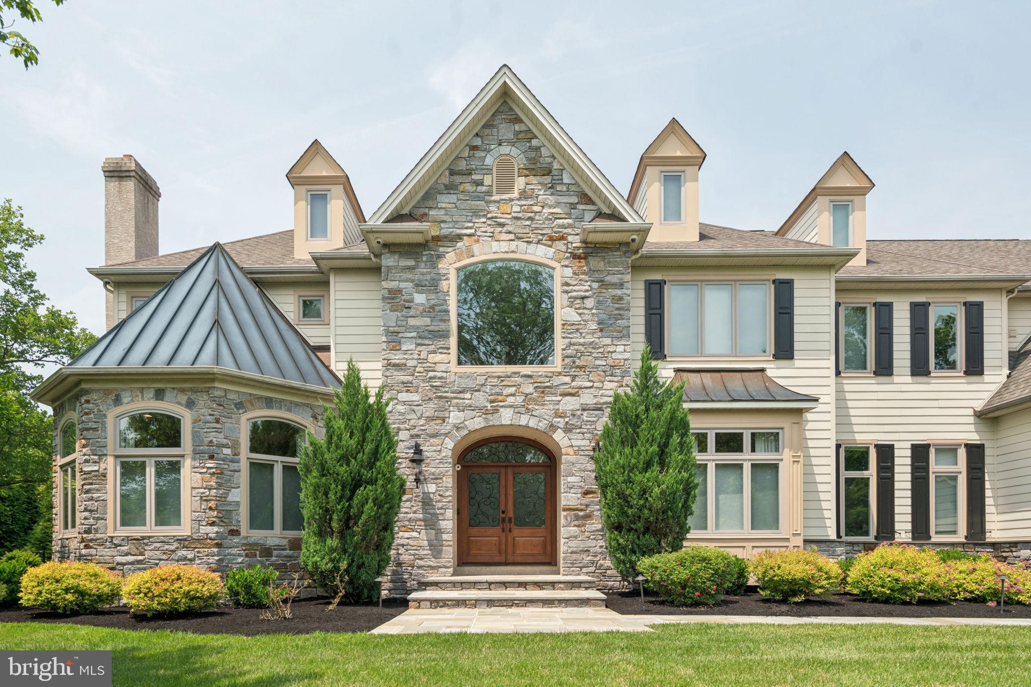 801 South Penn Oak Road Lower Gwynedd, PA 19002 - Photo 2 of 114 a front view of a house with a yard