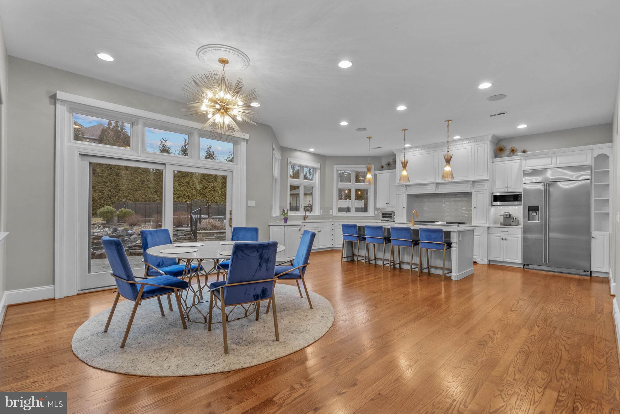 801 South Penn Oak Road Lower Gwynedd, PA 19002 - Photo 23 of 114 a view of a dining room with furniture and chandelier