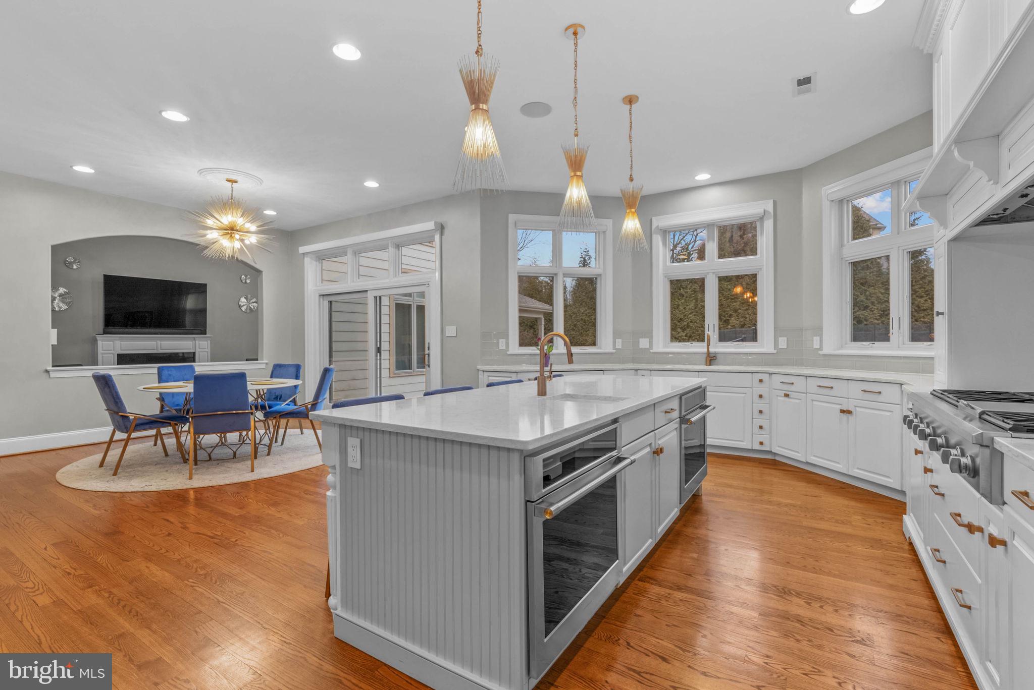 801 South Penn Oak Road Lower Gwynedd, PA 19002 - Photo 28 of 114 a kitchen with stainless steel appliances granite countertop a stove and a wooden floors