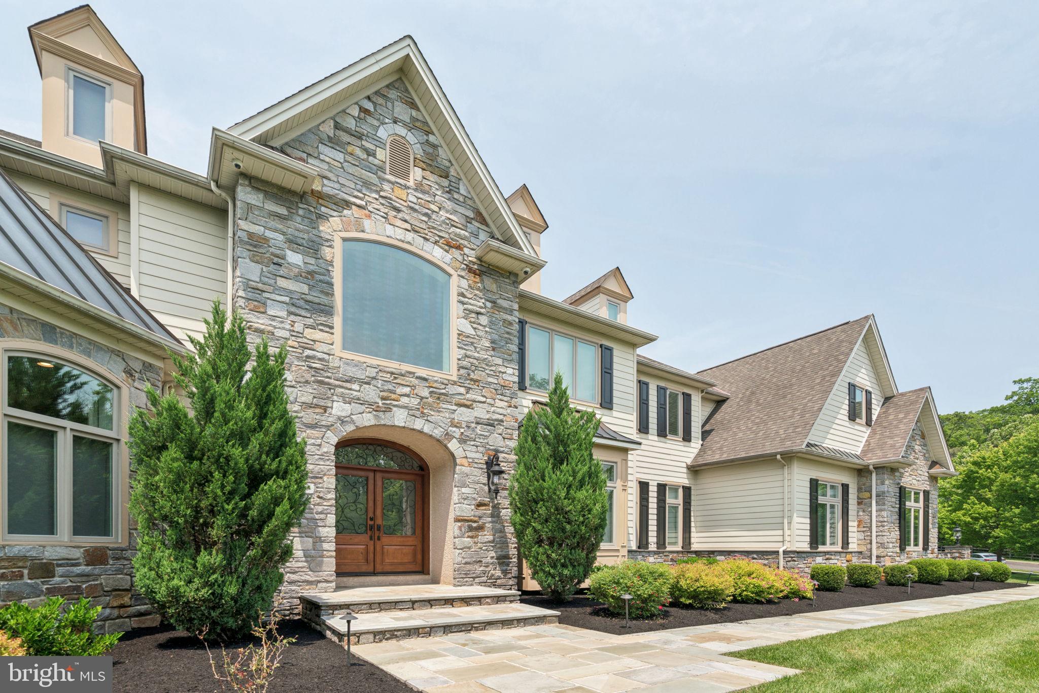 801 South Penn Oak Road Lower Gwynedd, PA 19002 - Photo 3 of 114 a front view of a house with garden