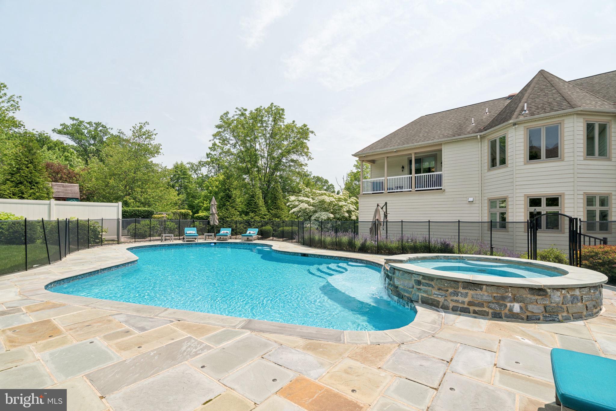 801 South Penn Oak Road Lower Gwynedd, PA 19002 - Photo 48 of 114 a view of a house with pool fire pit and a yard