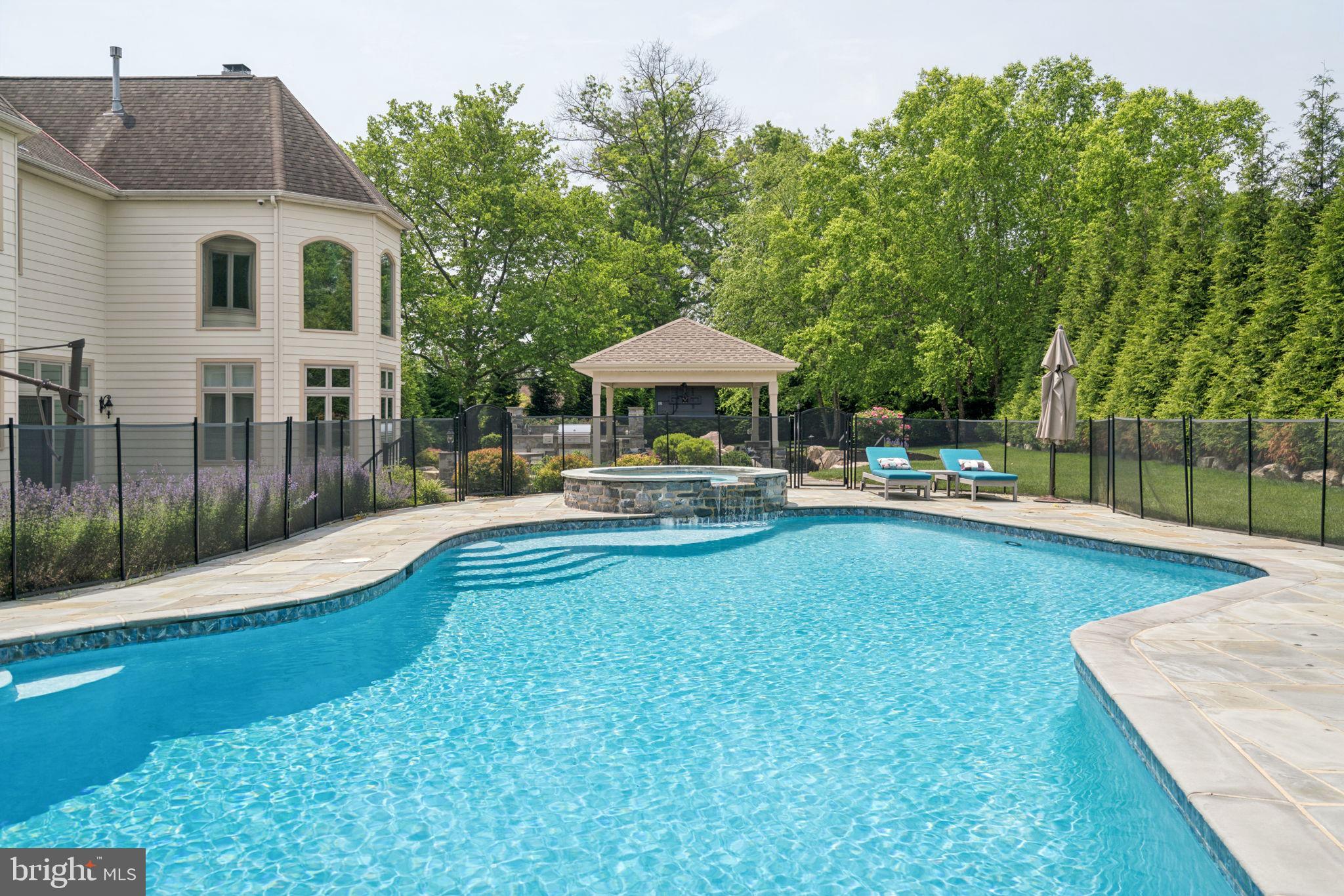 801 South Penn Oak Road Lower Gwynedd, PA 19002 - Photo 50 of 114 a swimming pool view with a seating space and a garden view