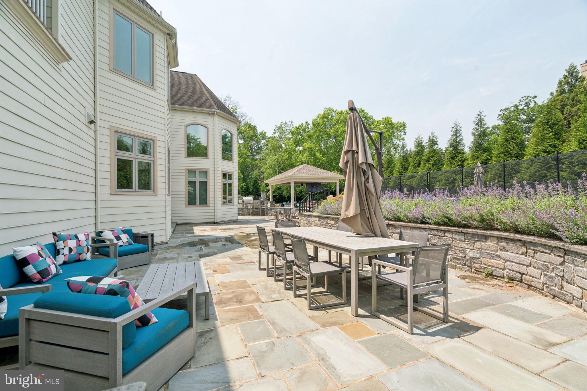 801 South Penn Oak Road Lower Gwynedd, PA 19002 - Photo 56 of 114 a view of a chairs and table in the patio