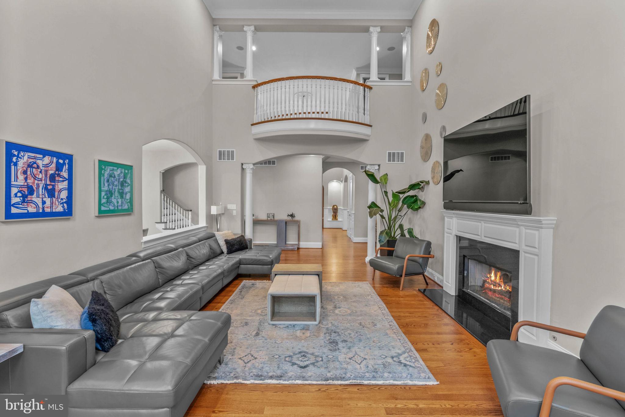 801 South Penn Oak Road Lower Gwynedd, PA 19002 - Photo 6 of 29 a living room with furniture fireplace and wooden floor