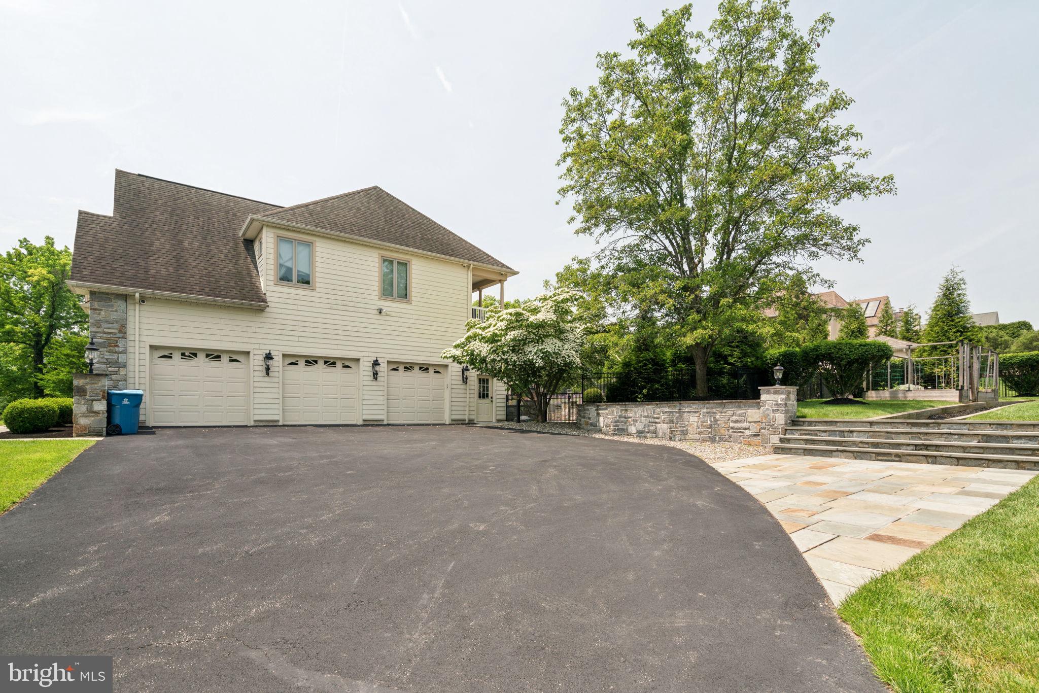 801 South Penn Oak Road Lower Gwynedd, PA 19002 - Photo 7 of 114 a view of a house with a yard and large trees