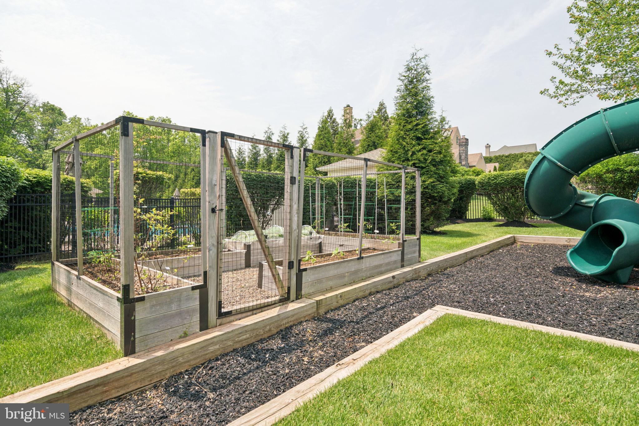 801 South Penn Oak Road Lower Gwynedd, PA 19002 - Photo 98 of 114 a view of a garden with a slide