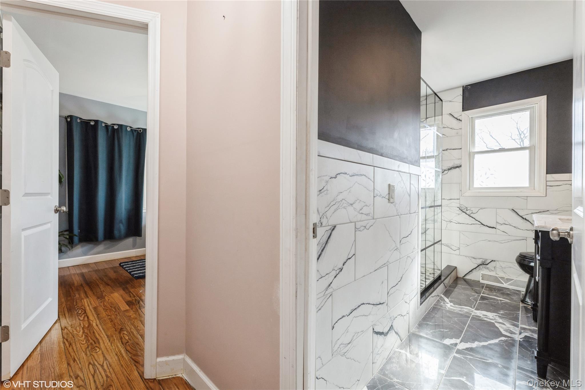 289 Quaker Road Pomona, NY 10970 - Photo 10 of 30 a bathroom with a bathtub and shower