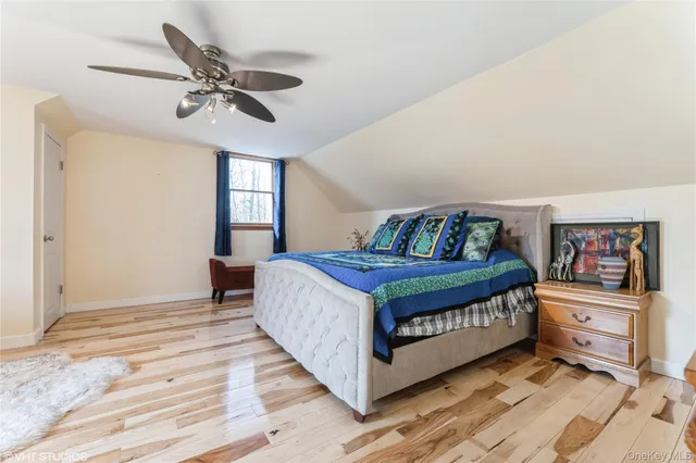 a bedroom with furniture and window