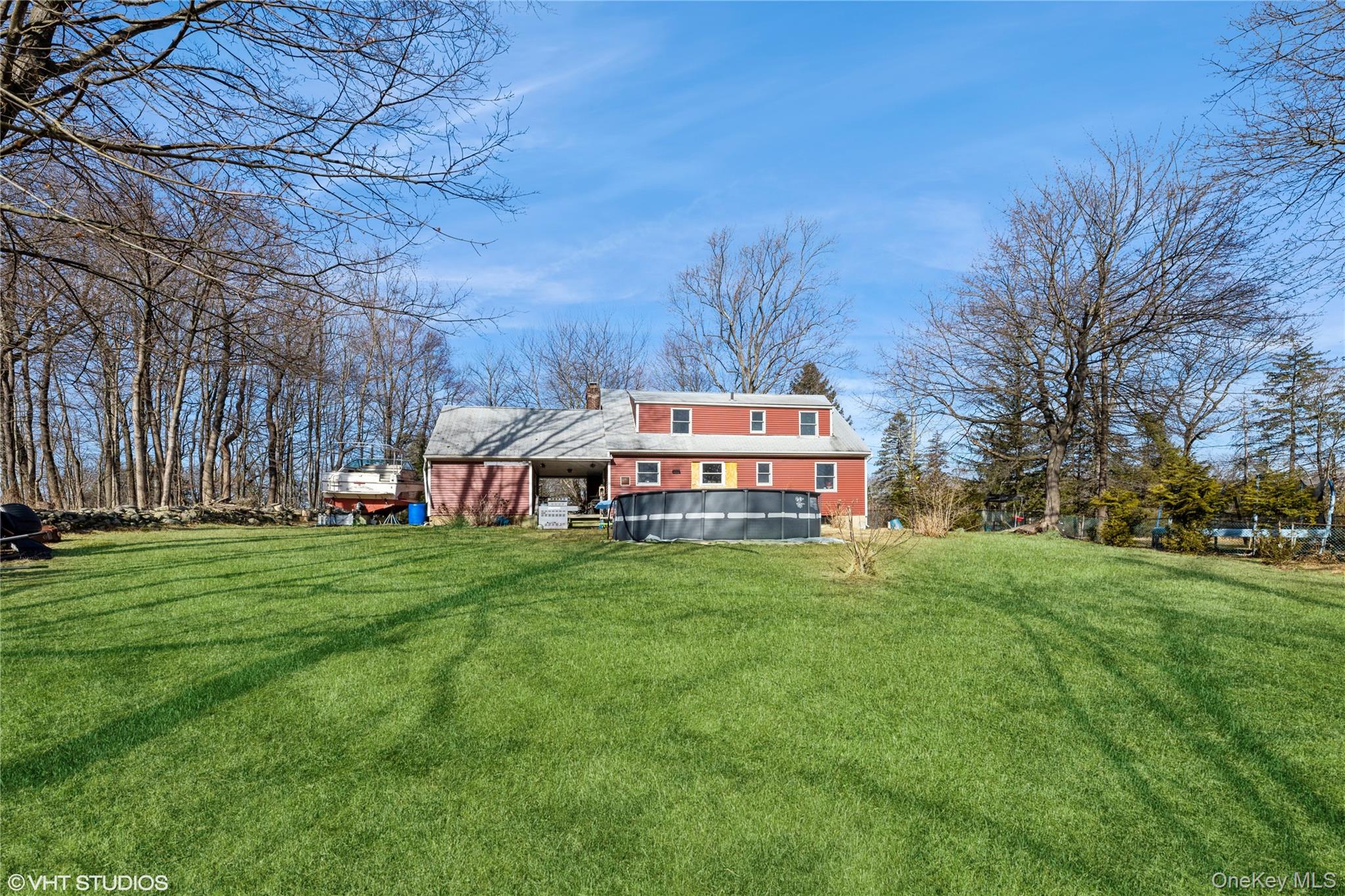 289 Quaker Road Pomona, NY 10970 - Photo 24 of 30 a front view of a house with a garden