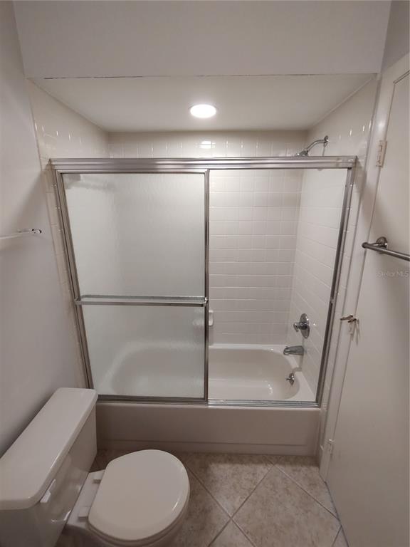 8491 Southwest 109th Street Ocala, FL 34481 - Photo 19 of 39 a bathroom with a toilet and a shower