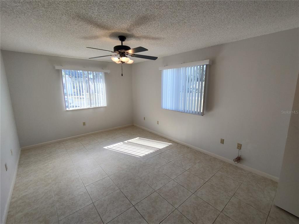 8491 Southwest 109th Street Ocala, FL 34481 - Photo 21 of 39 a view of empty room with windows
