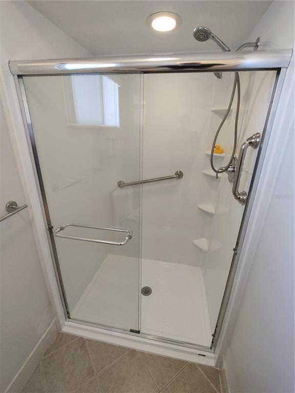 8491 Southwest 109th Street Ocala, FL 34481 - Photo 26 of 39 a bathroom with a shower