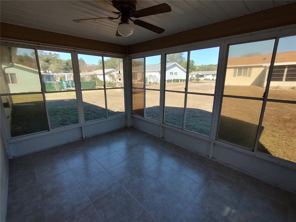 8491 Southwest 109th Street Ocala, FL 34481 - Photo 30 of 39 a view of an empty room with a balcony
