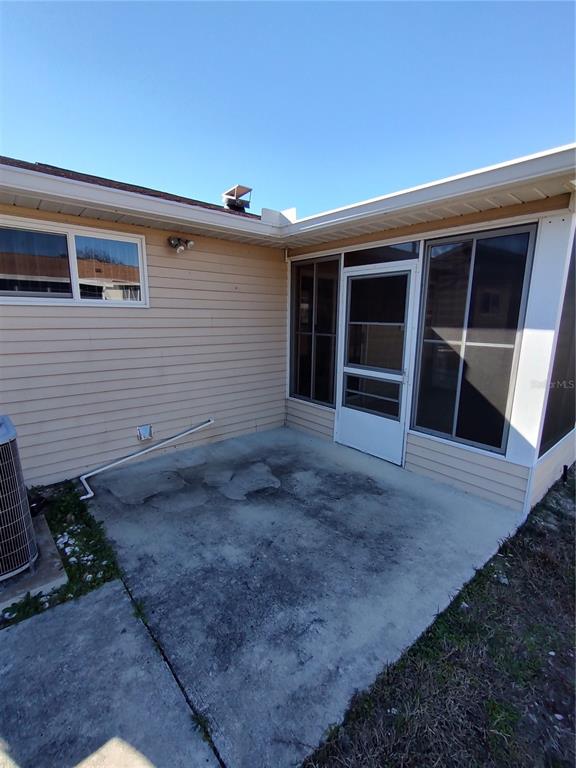 8491 Southwest 109th Street Ocala, FL 34481 - Photo 33 of 39 a view of a house with a yard