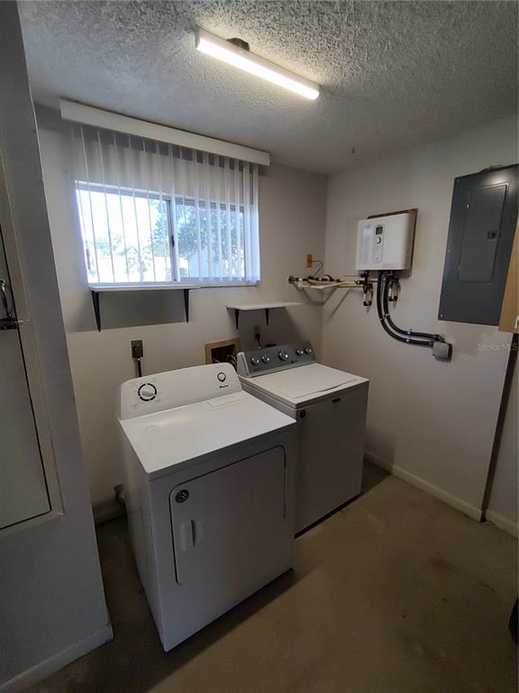 8491 Southwest 109th Street Ocala, FL 34481 - Photo 37 of 39 a utility room with dryer and washer