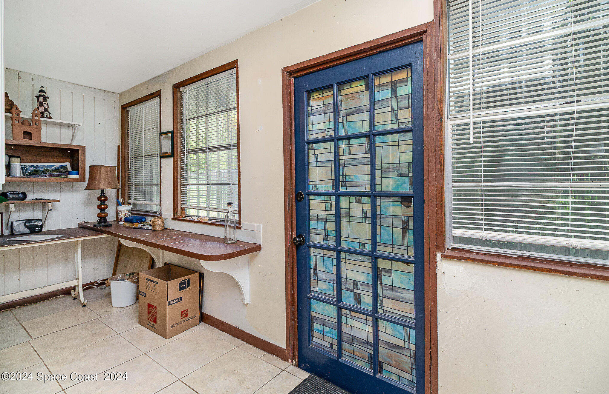 1707 Platt Street Melbourne, FL 32901 - Photo 11 of 32 a kitchen with a sink appliances and cabinets