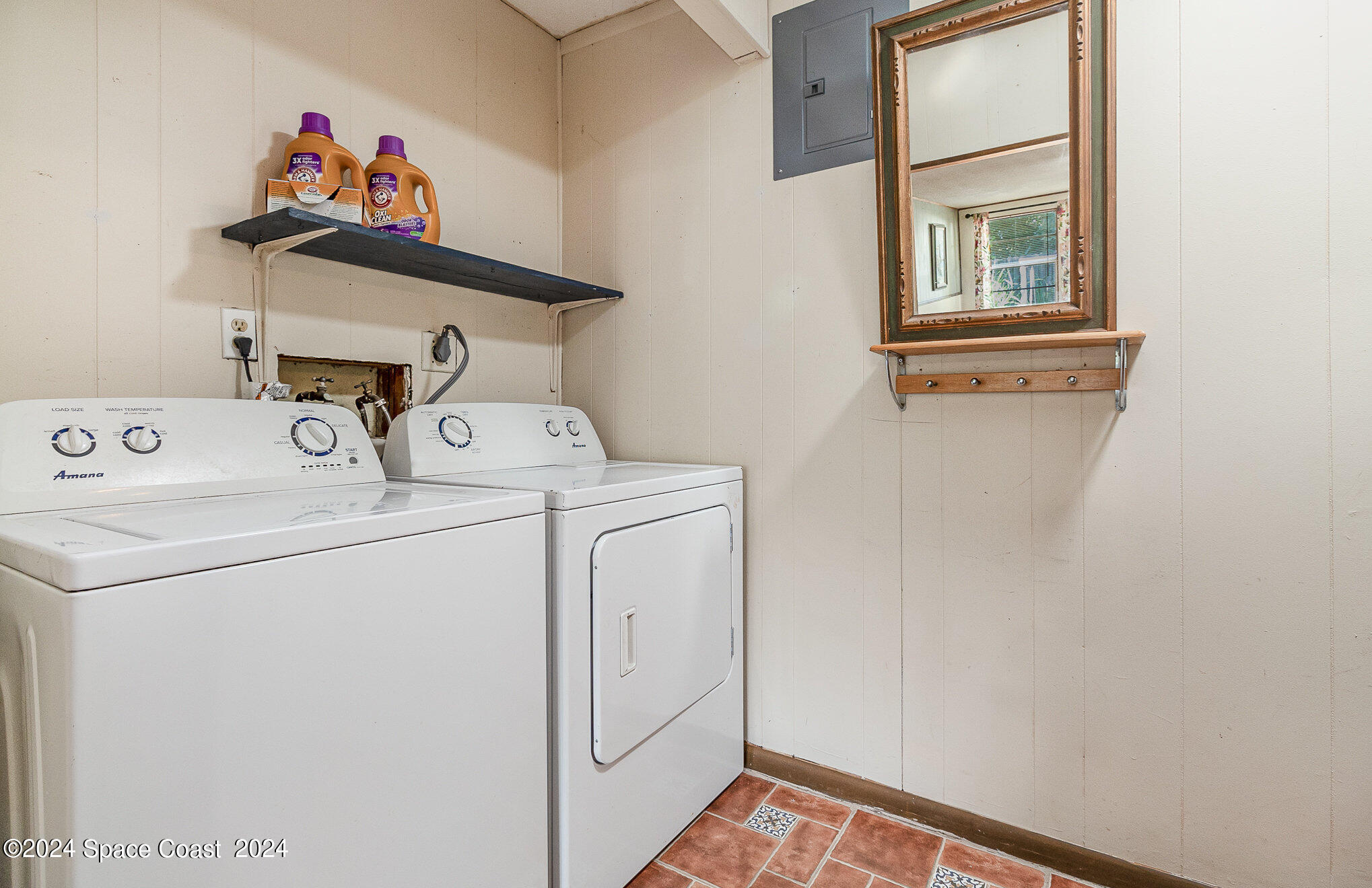 1707 Platt Street Melbourne, FL 32901 - Photo 18 of 32 a utility room with dryer and washer
