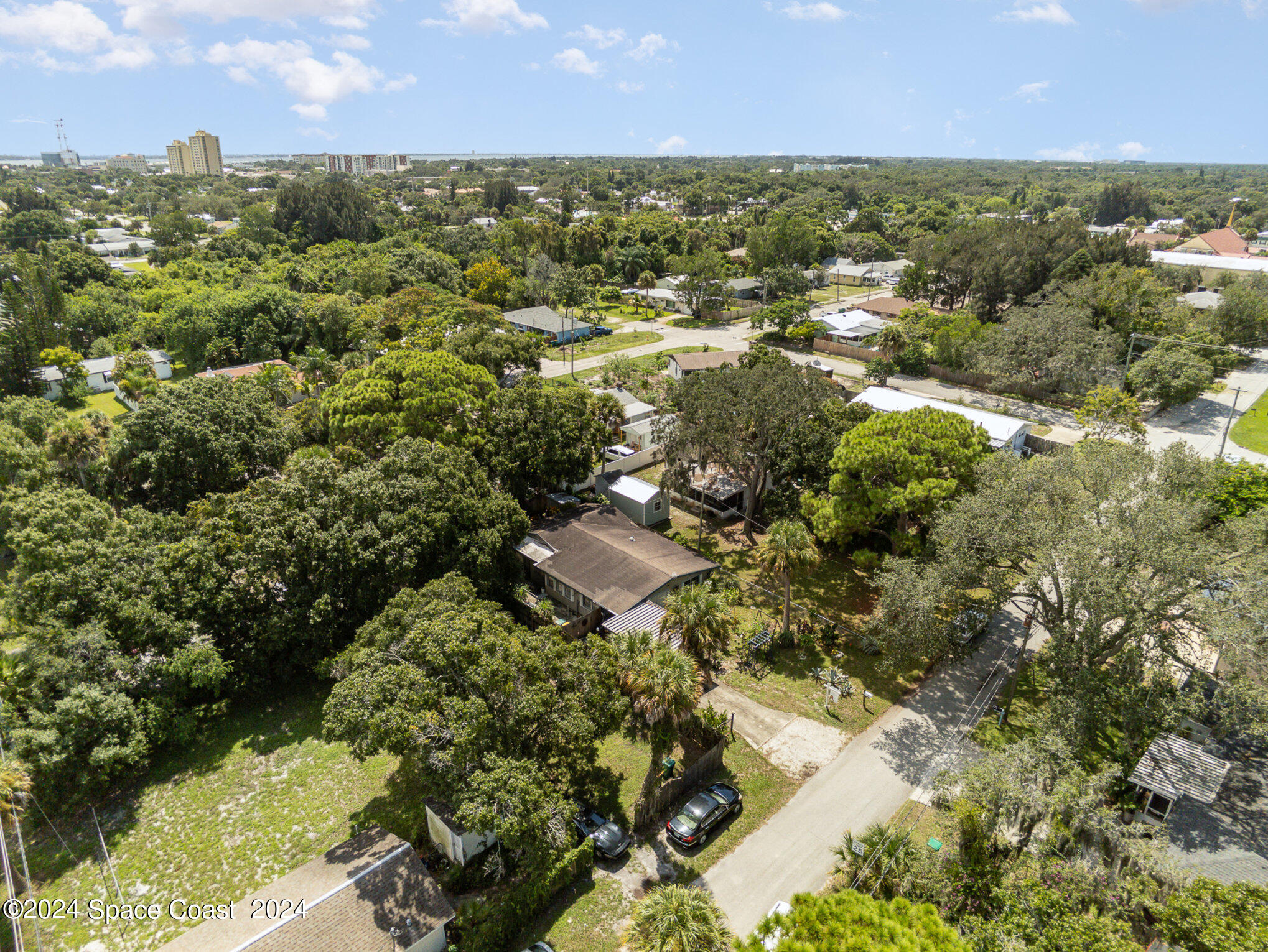 1707 Platt Street Melbourne, FL 32901 - Photo 24 of 32 an aerial view of residential house with yard and outdoor seating