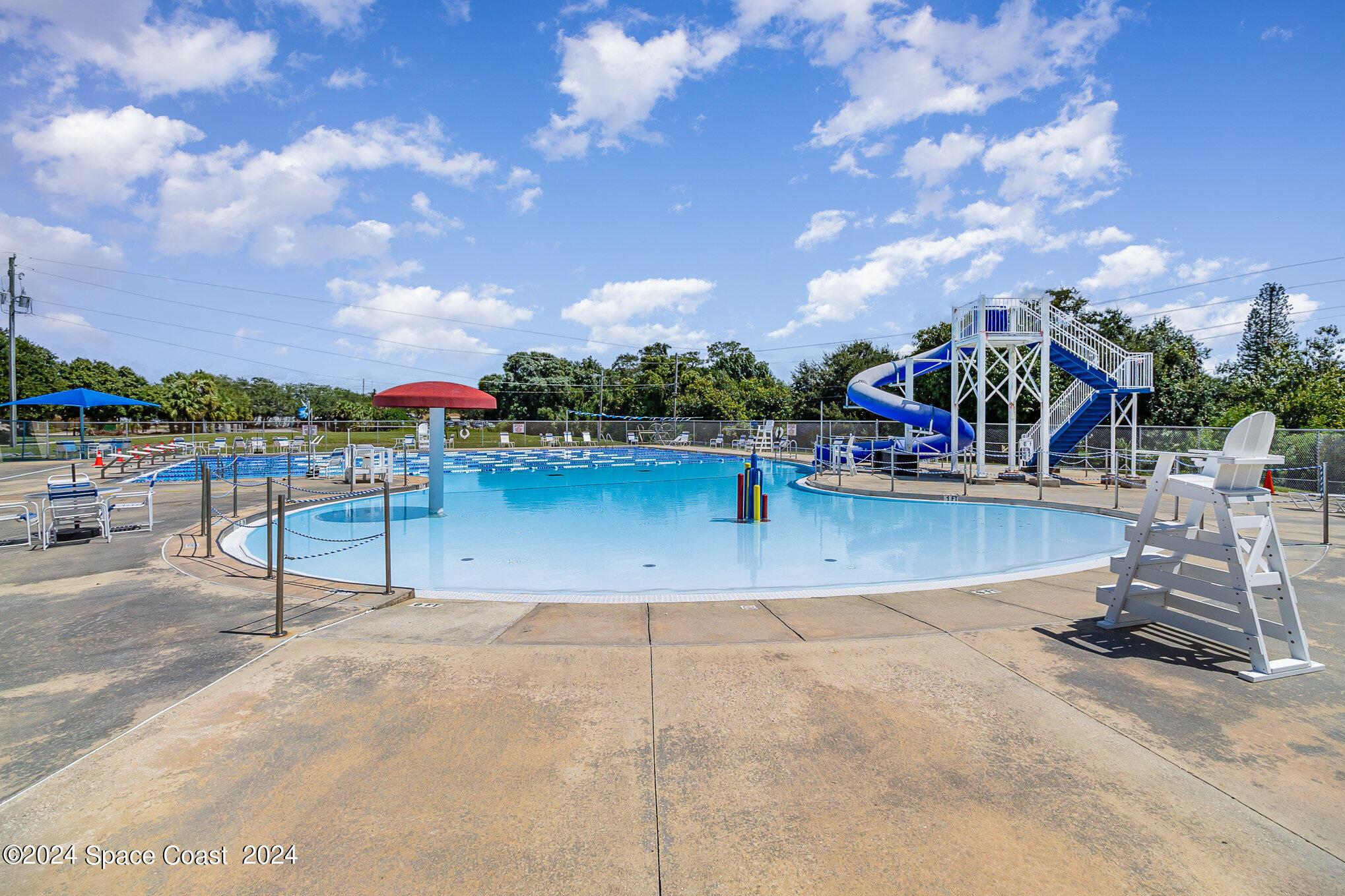 1707 Platt Street Melbourne, FL 32901 - Photo 29 of 32 a view of a park with swings and slides