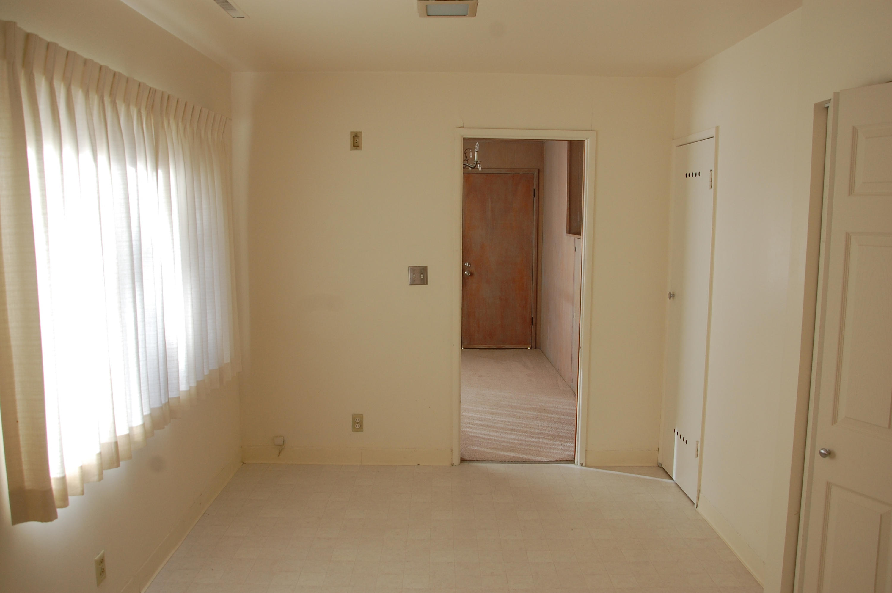 3933 Foothill Road Santa Barbara, CA 93110 - Photo 21 of 28 a view of an empty room with windows