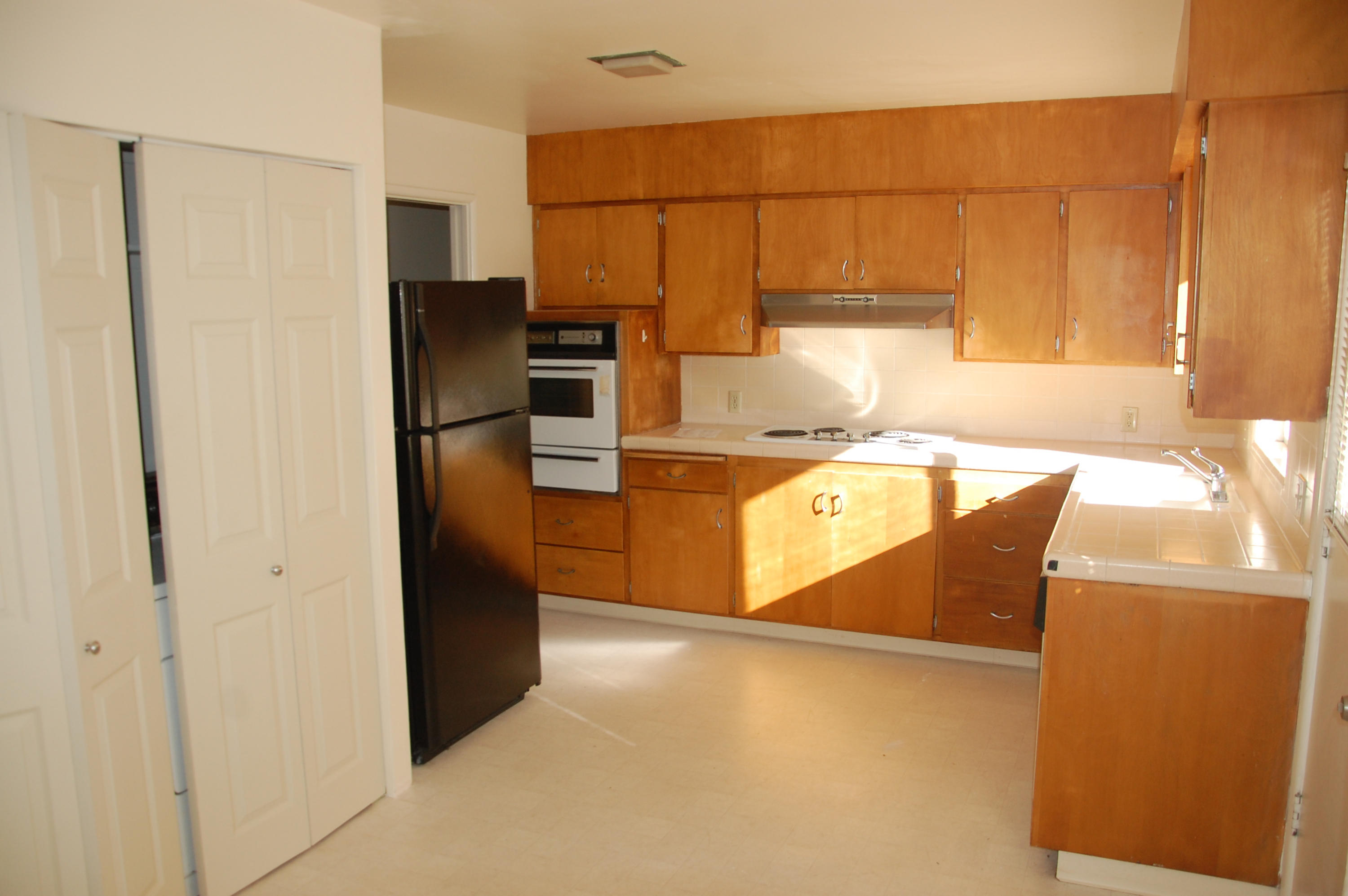 3933 Foothill Road Santa Barbara, CA 93110 - Photo 23 of 28 a kitchen with stainless steel appliances a refrigerator and a stove