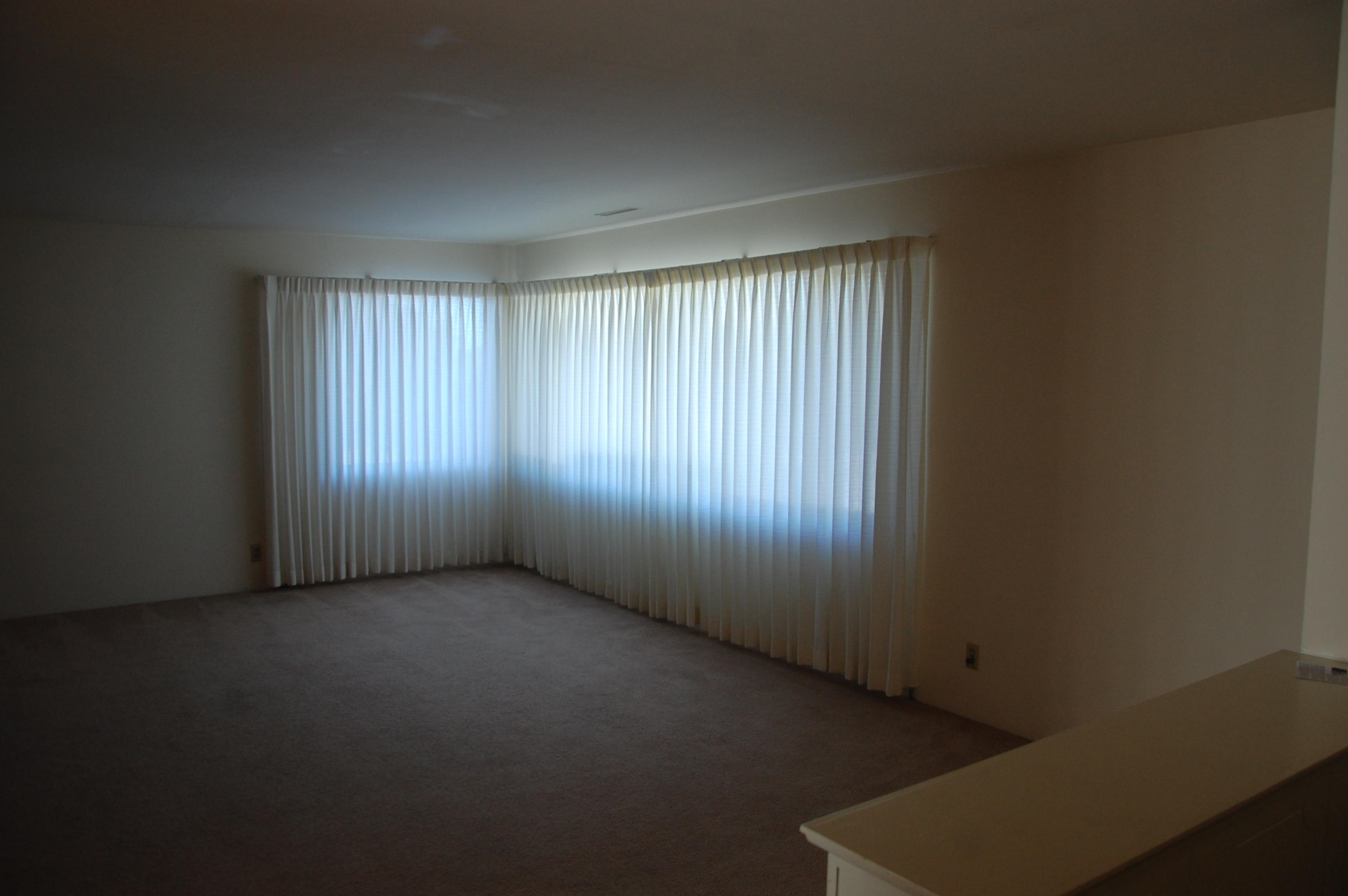 3933 Foothill Road Santa Barbara, CA 93110 - Photo 6 of 28 an empty room with windows