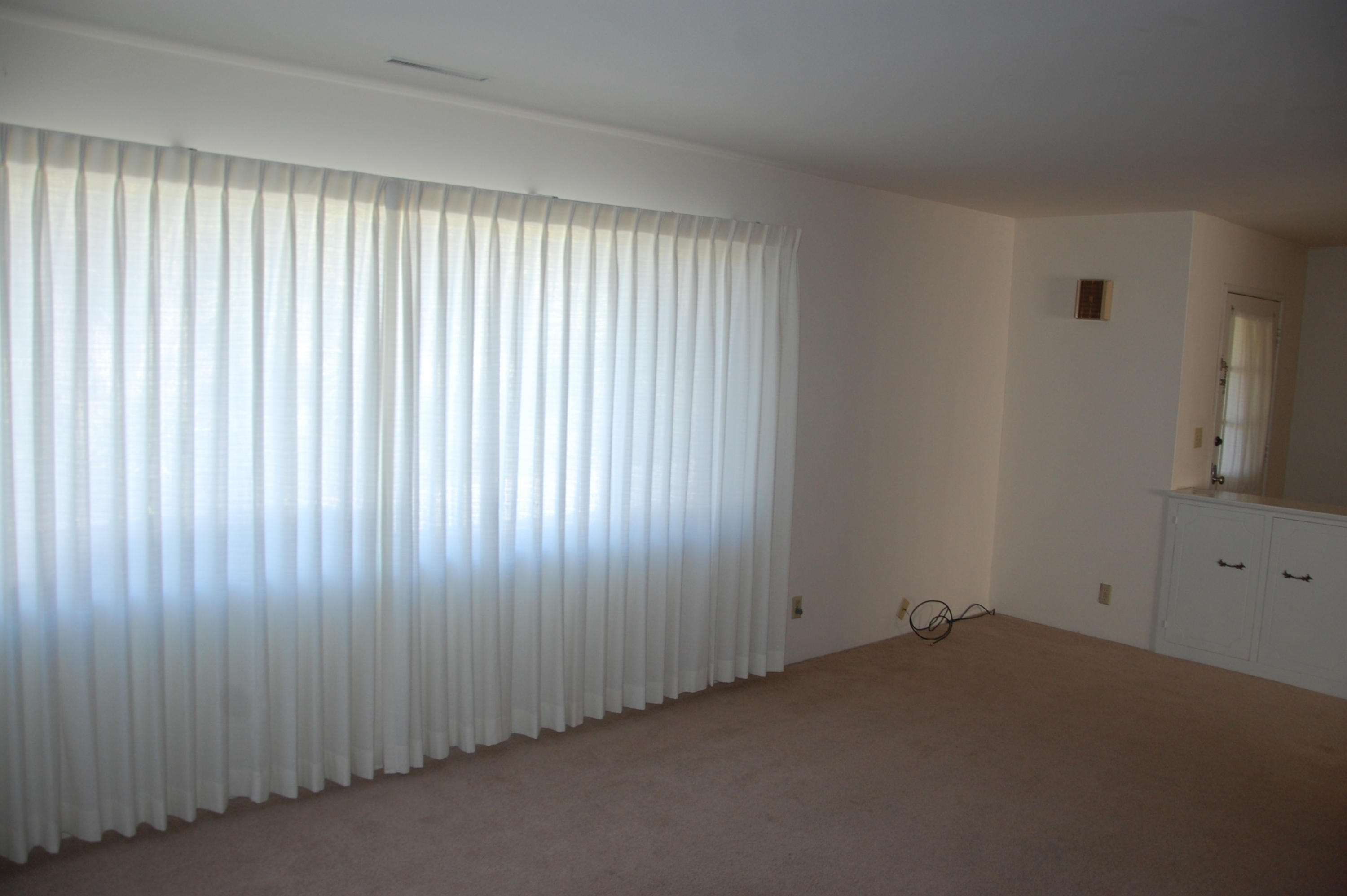 3933 Foothill Road Santa Barbara, CA 93110 - Photo 8 of 28 an empty room with a window