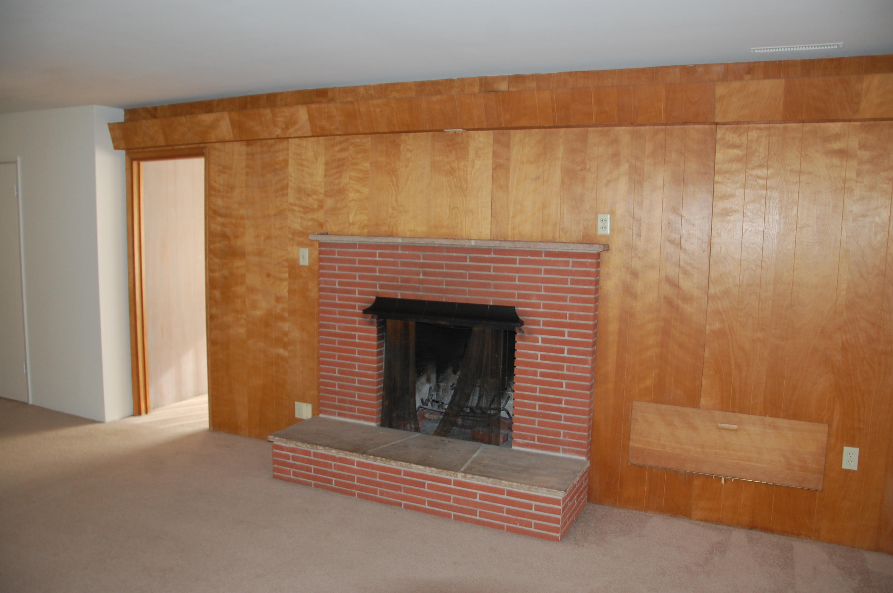 3933 Foothill Road Santa Barbara, CA 93110 - Photo 10 of 28 a view of fireplace with washer and dryer
