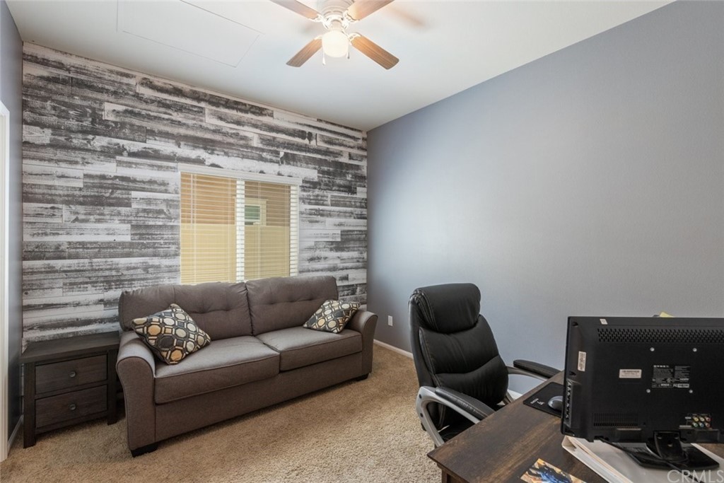 24802 Sandy Trail Place Menifee, CA 92584 - Photo 11 of 42 a living room with furniture and a window