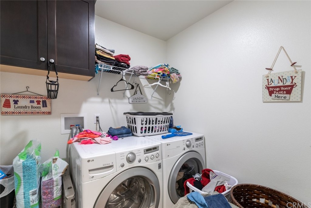 24802 Sandy Trail Place Menifee, CA 92584 - Photo 13 of 42 a view of storage and utility