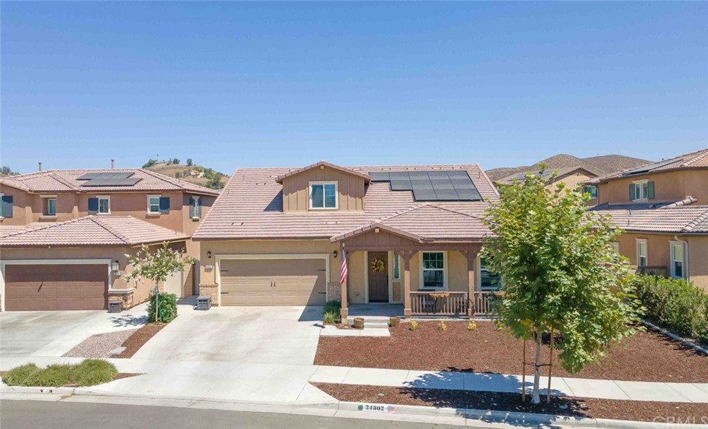 24802 Sandy Trail Place Menifee, CA 92584 - Photo 35 of 42 front view of a house with a yard