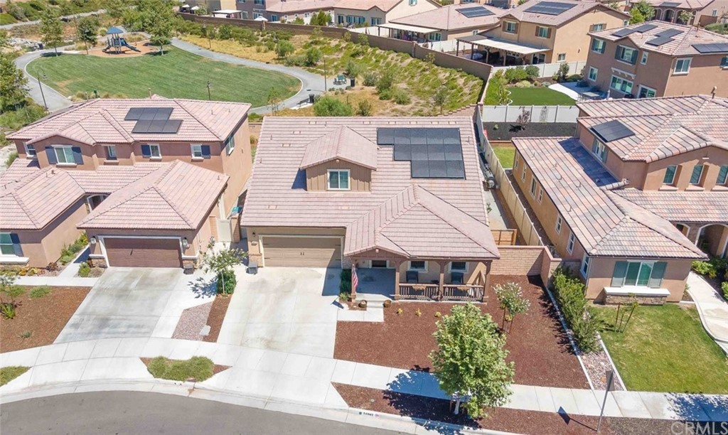 24802 Sandy Trail Place Menifee, CA 92584 - Photo 36 of 42 an aerial view of a house with a garden and plants