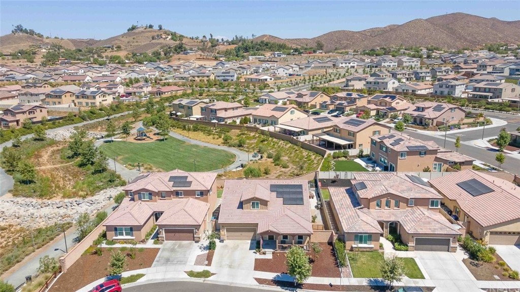 24802 Sandy Trail Place Menifee, CA 92584 - Photo 37 of 42 an aerial view of residential houses with outdoor space