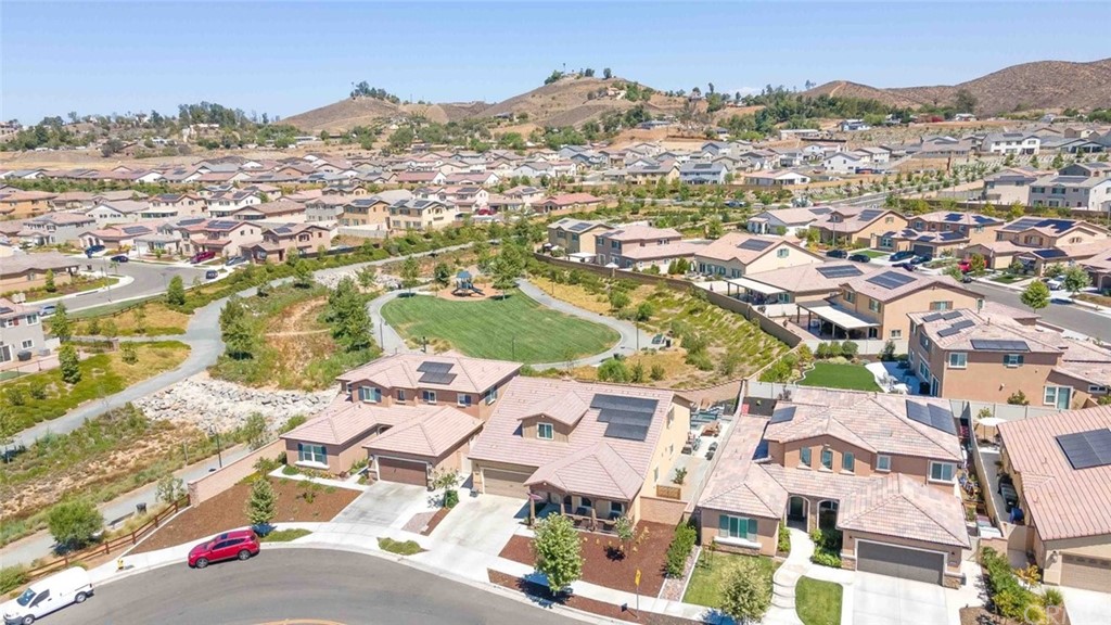 24802 Sandy Trail Place Menifee, CA 92584 - Photo 39 of 42 an aerial view of residential houses with outdoor space