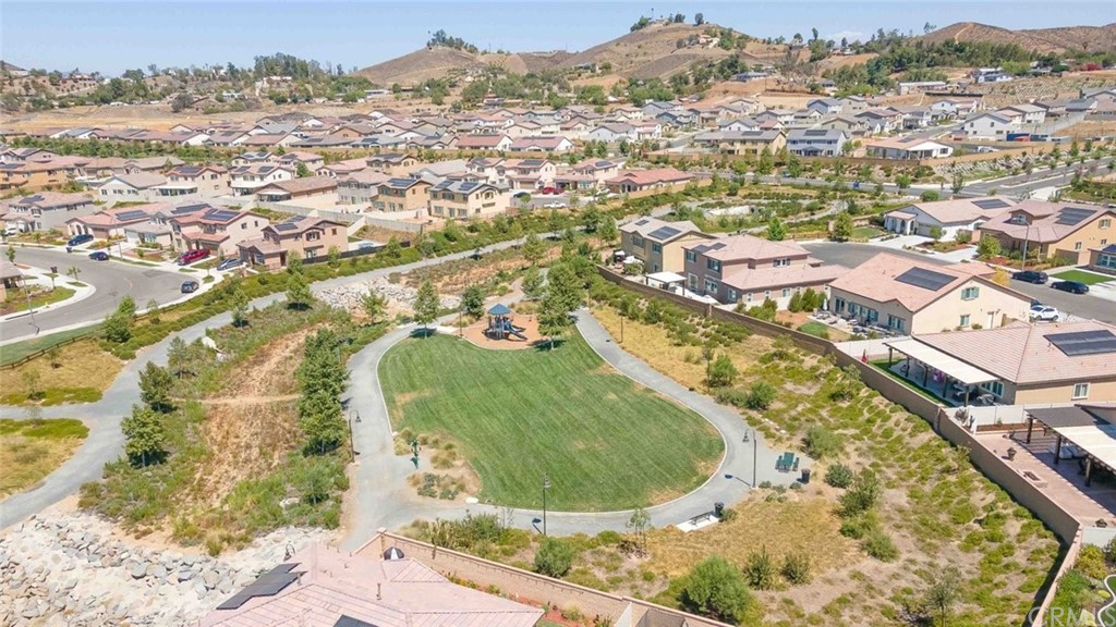 24802 Sandy Trail Place Menifee, CA 92584 - Photo 40 of 42 an aerial view of residential houses with outdoor space